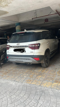 Polar White Hyundai Alcazar 1.5 AT Signature (O) 6 Str