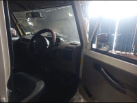 White Mahindra Bolero BSIV