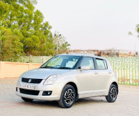 Silver Maruti Suzuki Swift VXI