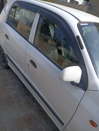White Hyundai Santro Xing