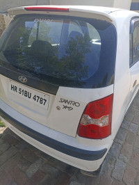 White Hyundai Santro Xing