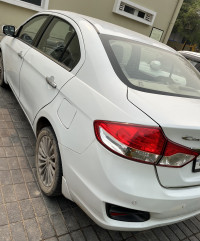 White Maruti Suzuki Ciaz Alfa top model diesel hybrid