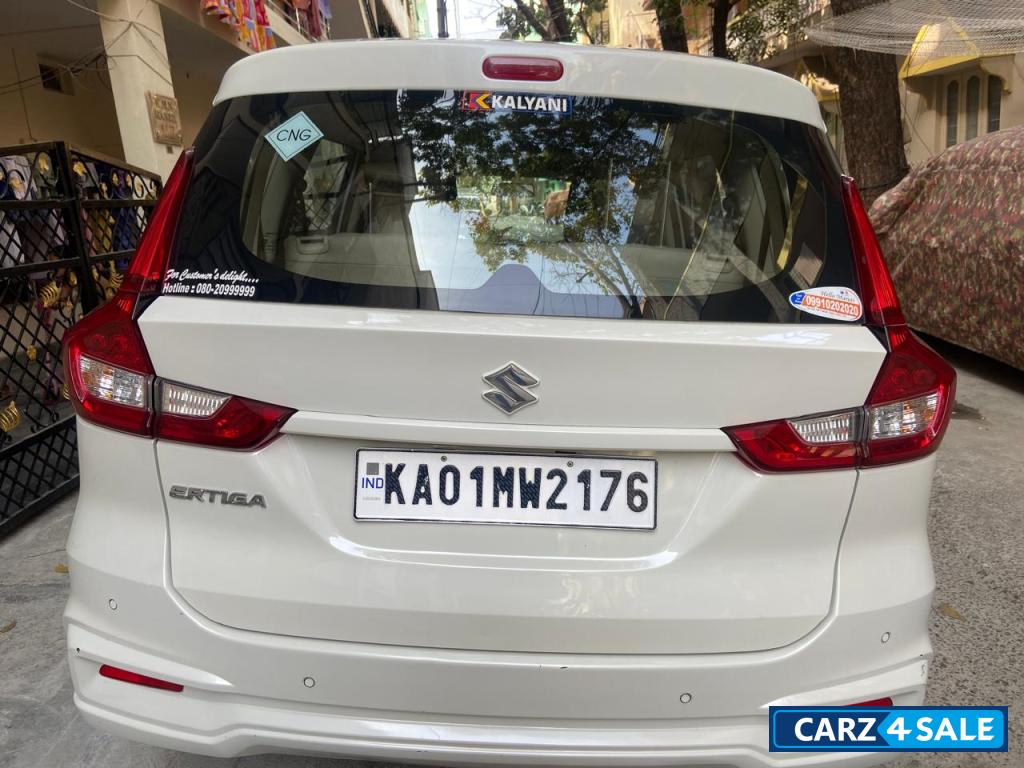 Pearl Arctic White Maruti Suzuki Ertiga VXICNG