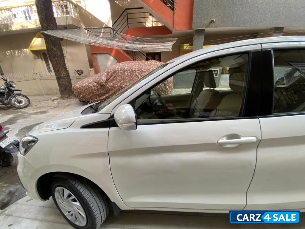 Pearl Arctic White Maruti Suzuki Ertiga VXICNG