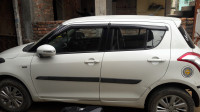 White Maruti Suzuki Swift ZDI