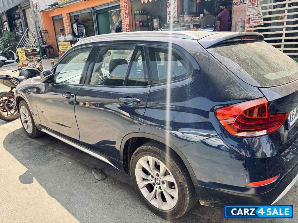 Blue BMW X1 2013