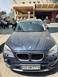 Blue BMW X1 2013