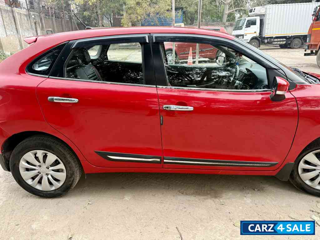 Red Maruti Suzuki Baleno Delta