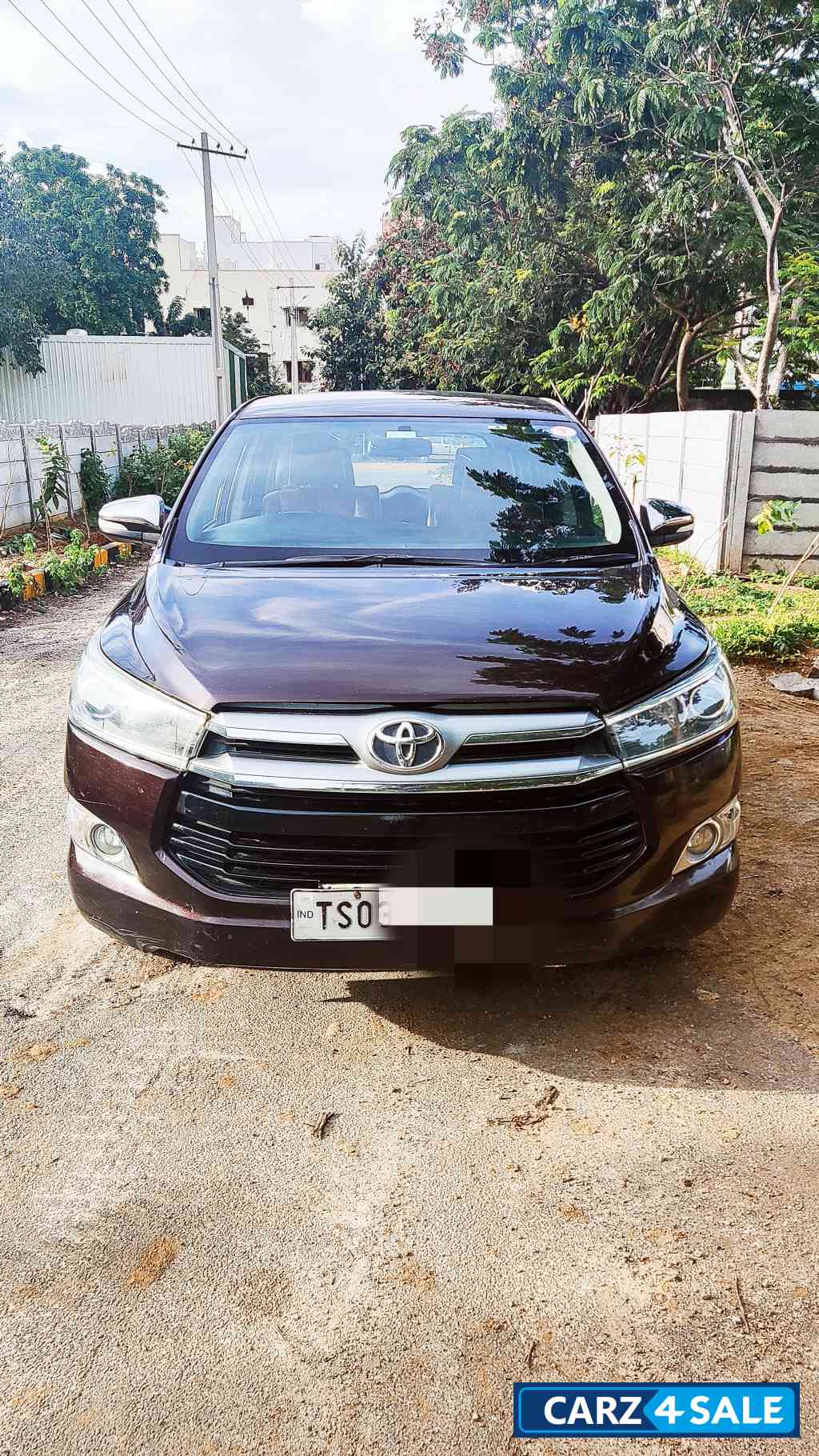 Garnet Red Toyota Innova Crysta 2.8Zx