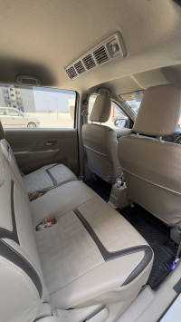 White Maruti Suzuki Ertiga VXI O CNG