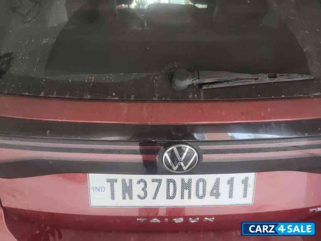 Red Volkswagen Taigun Topline MT