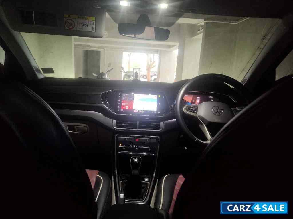 Red Volkswagen Taigun Topline MT