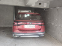 Red Volkswagen Taigun Topline MT