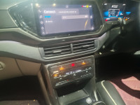 Red Volkswagen Taigun Topline MT