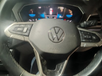 Red Volkswagen Taigun Topline MT