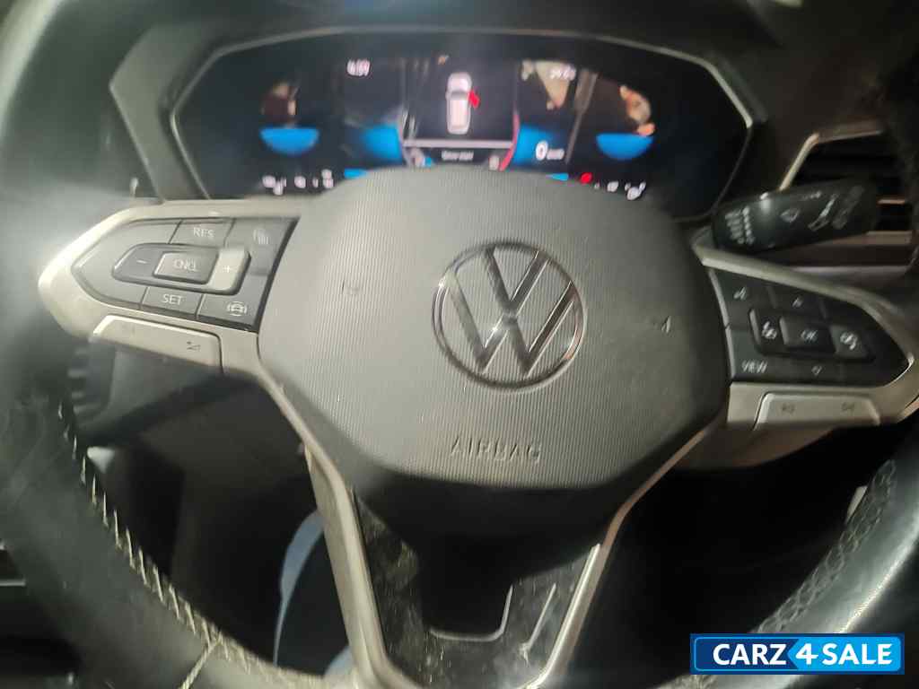 Red Volkswagen Taigun Topline MT