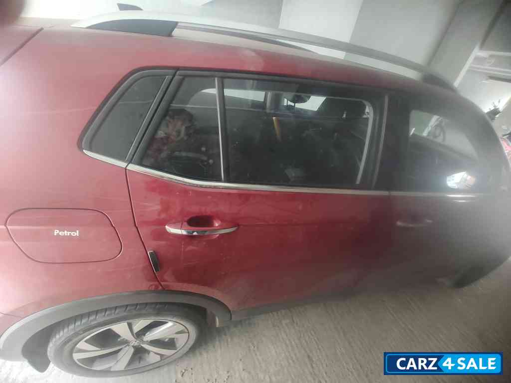 Red Volkswagen Taigun Topline MT