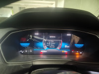 Red Volkswagen Taigun Topline MT