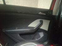 Red Volkswagen Taigun Topline MT