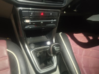 Red Volkswagen Taigun Topline MT