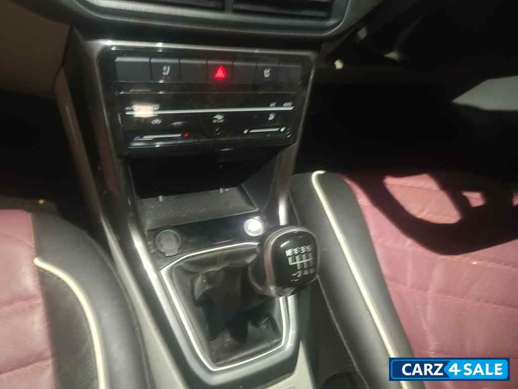 Red Volkswagen Taigun Topline MT