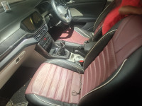 Red Volkswagen Taigun Topline MT