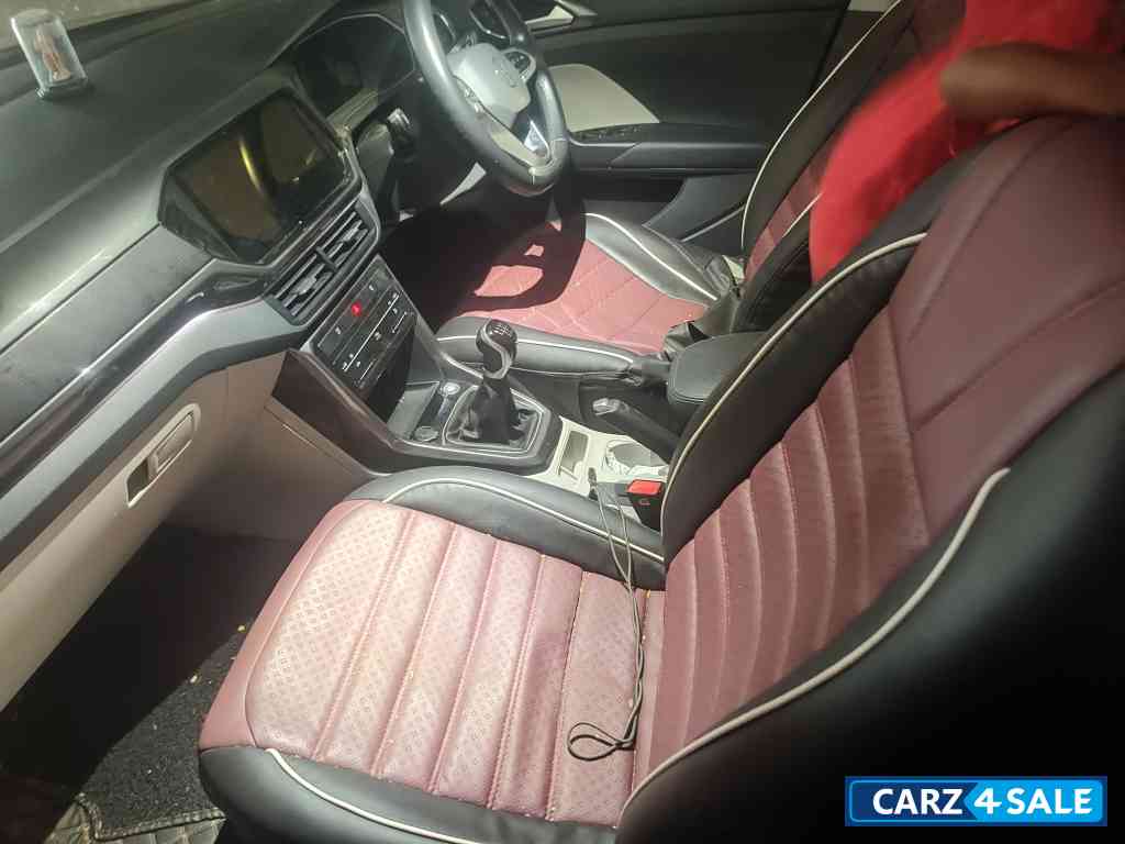 Red Volkswagen Taigun Topline MT