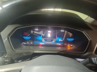 Red Volkswagen Taigun Topline MT