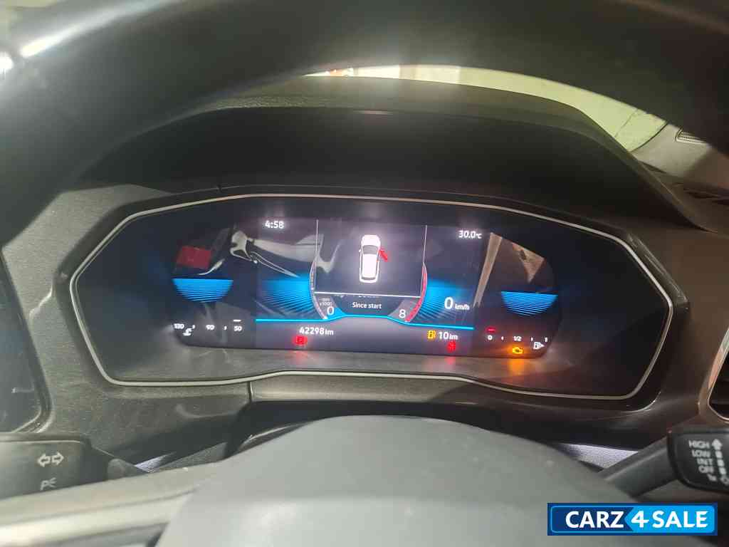 Red Volkswagen Taigun Topline MT