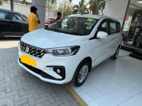 White Maruti Suzuki Ertiga vxi o CNG