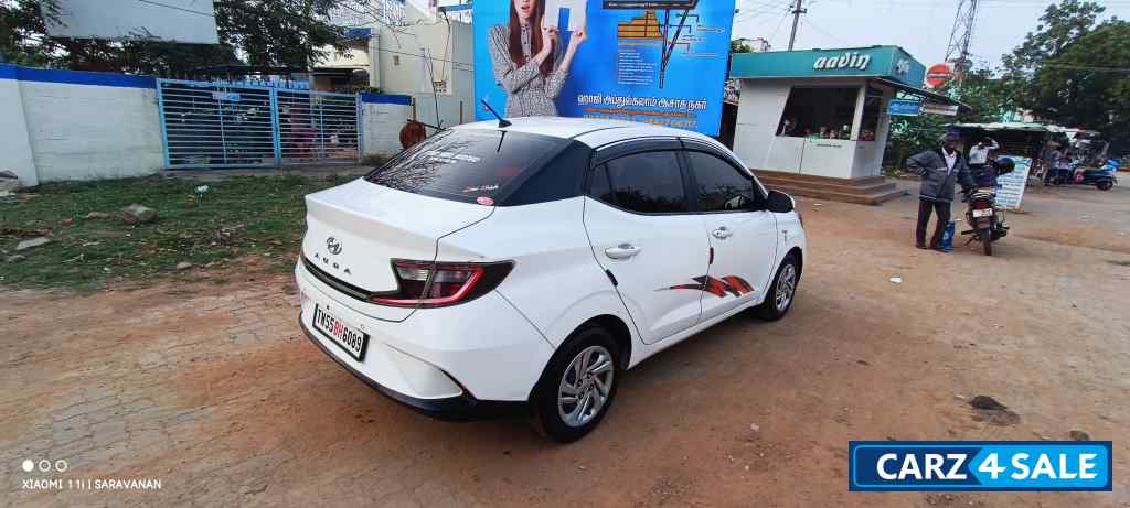 White Hyundai Aura Crdi s