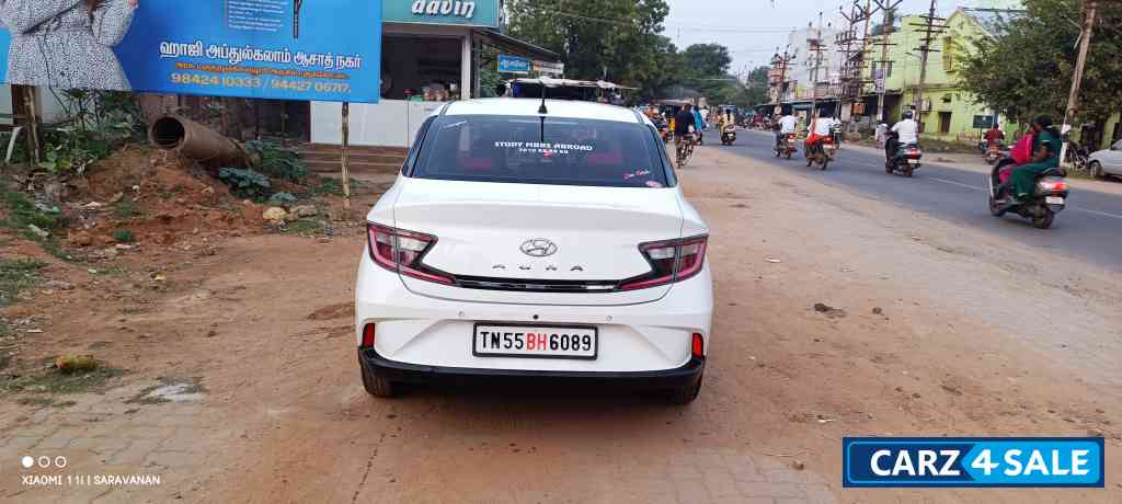White Hyundai Aura Crdi s