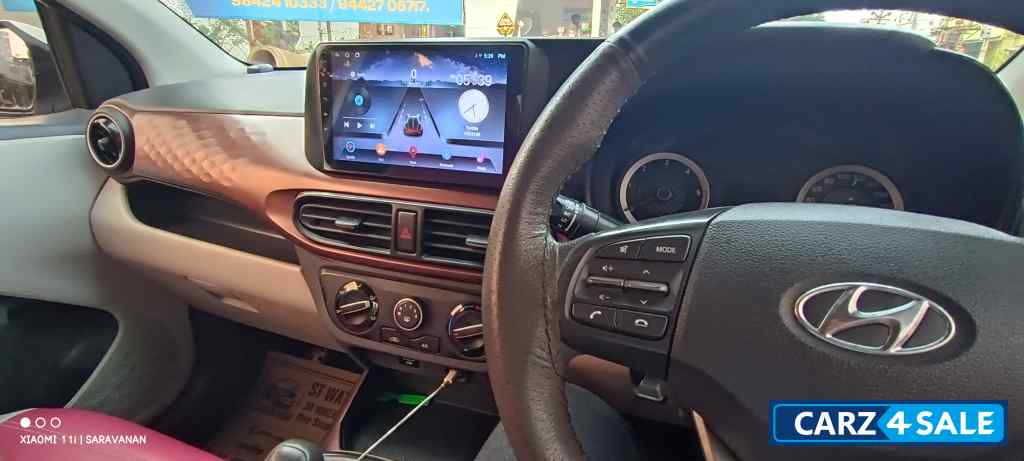 White Hyundai Aura Crdi s