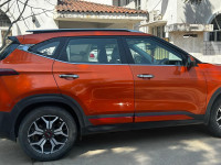 Orange Kia Seltos GTX+