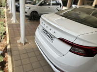 White Skoda Slavia Petrol