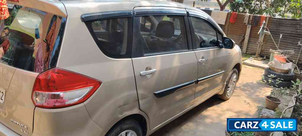 Gold Maruti Suzuki Ertiga Vxi