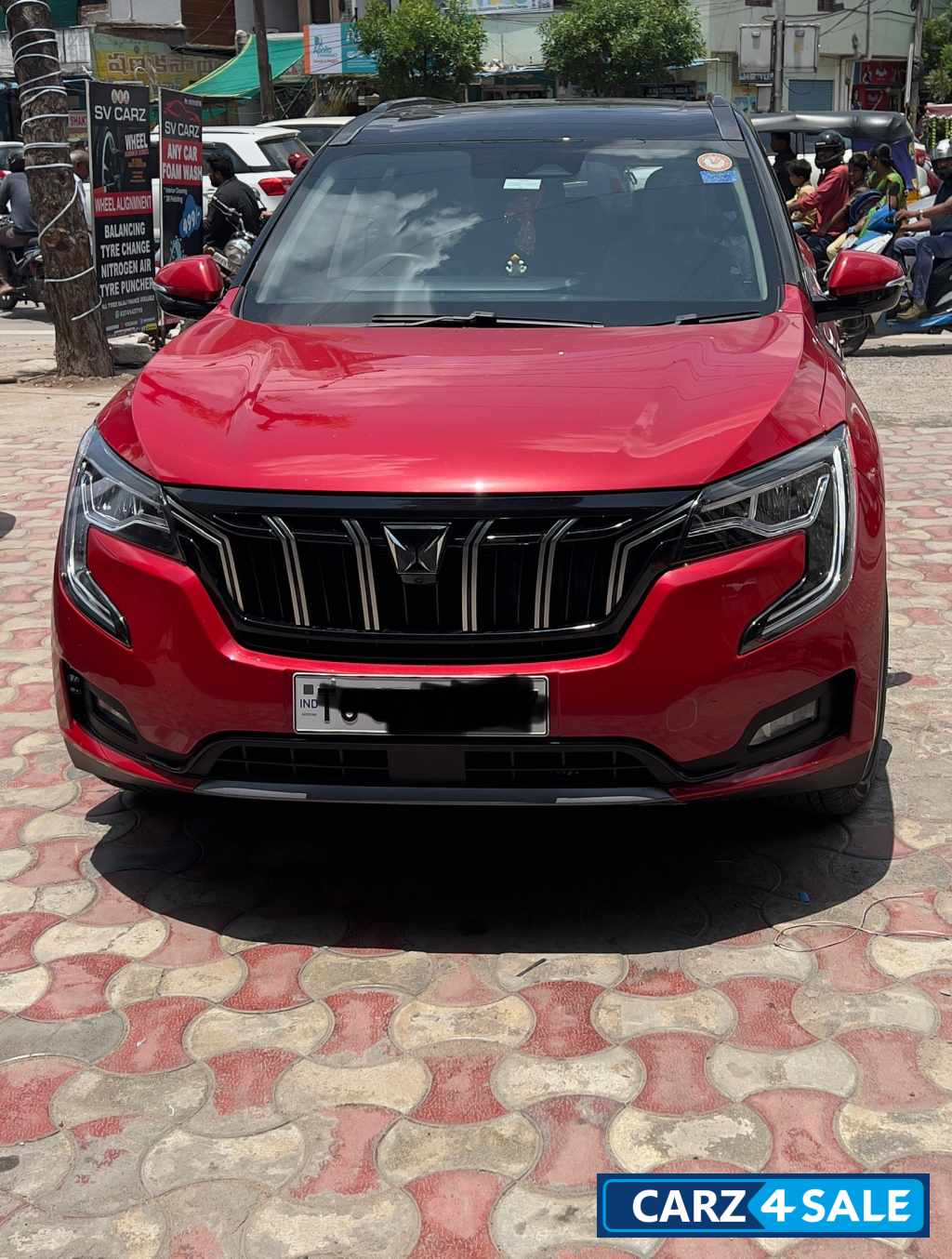Red Mahindra XUV700 Ax7 petrol automatic
