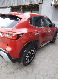Red Nissan Magnite XV Premium