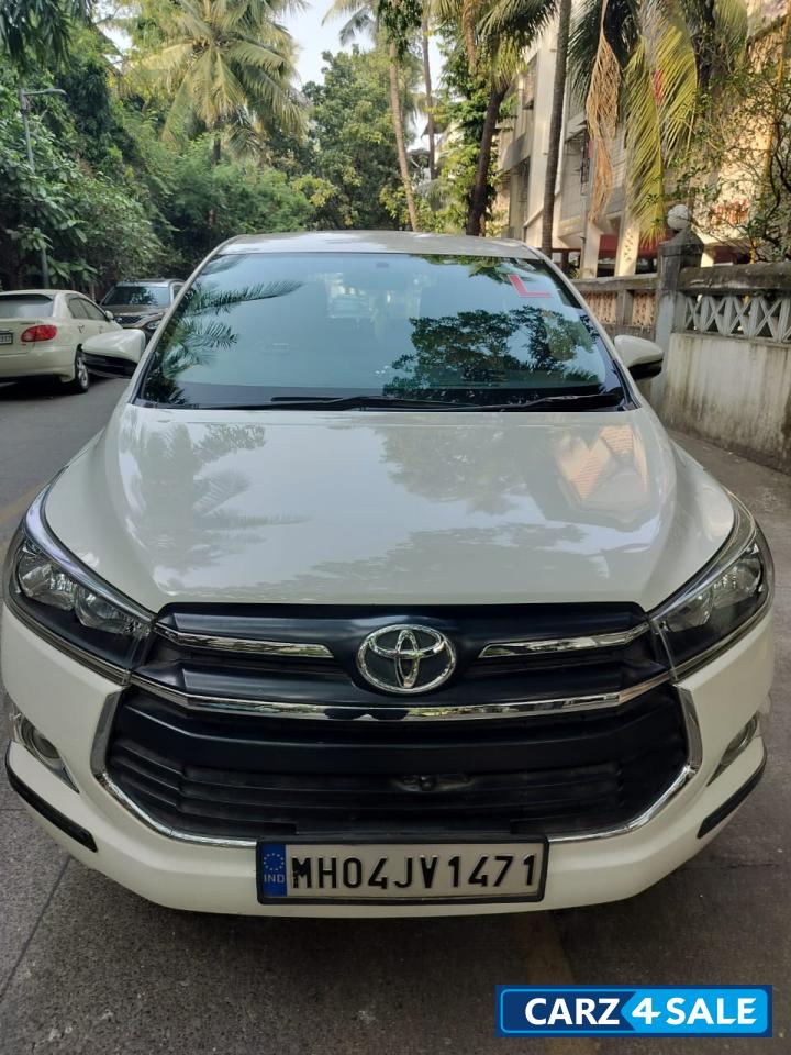 Super White Toyota Innova Crysta 2.4 G 8 Seater