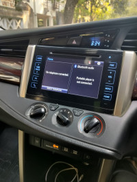 Super White Toyota Innova Crysta 2.4 G 8 Seater