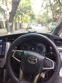 Super White Toyota Innova Crysta 2.4 G 8 Seater