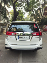 Super White Toyota Innova Crysta 2.4 G 8 Seater