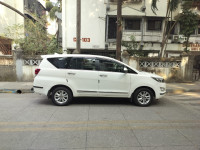 Super White Toyota Innova Crysta 2.4 G 8 Seater