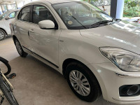 Pearl White Maruti Suzuki Dzire VXI