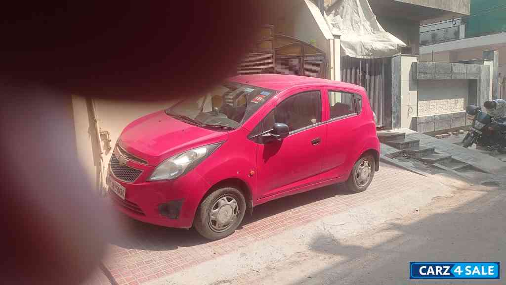 Red Chevrolet Beat LS