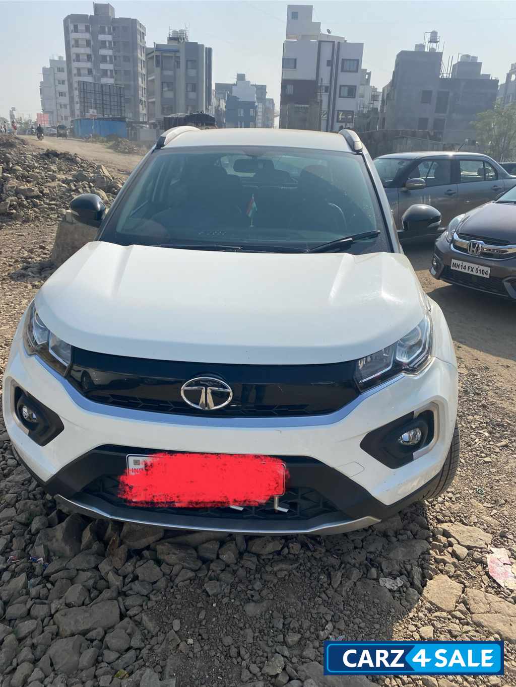 White Caligry Tata Nexon Xza+
