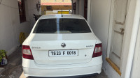 White Skoda Rapid Ambition