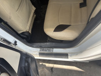 White Skoda Rapid Ambition