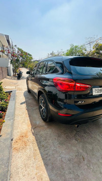 Black BMW X1 BSIV