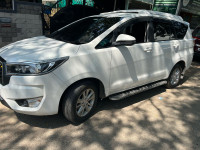 Pearlwhite Toyota Innova CRYSTA
